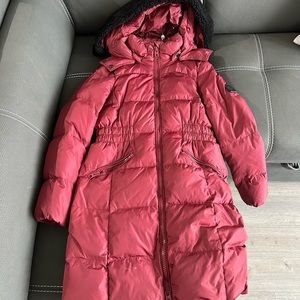Woman’s Coach size small burgundy winter jacket in great condition.